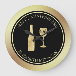 Goudglazen flesje en glas grote klok