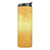 Goudglitter druppelt monogram op thermosbeker (Gedraaid links)