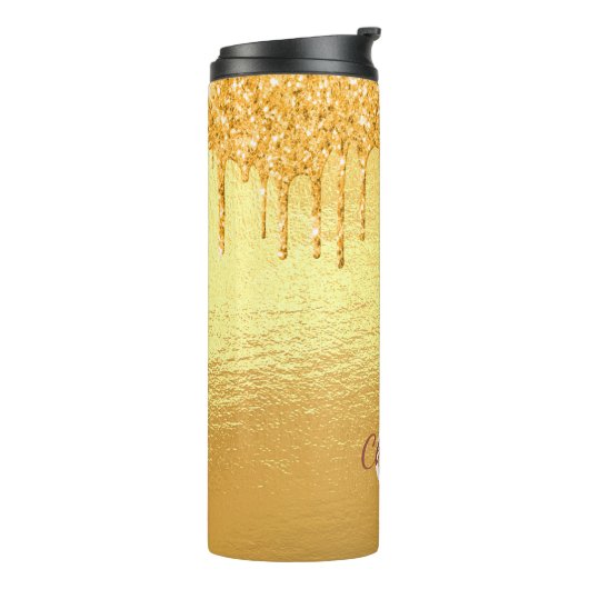 Goudglitter druppelt monogram op thermosbeker (Gedraaid links)