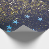 Goudglitter en glittering blauwe sterren op zwarte cadeaupapier (Hoek)