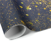 Goudglitter en glittering blauwe sterren op zwarte cadeaupapier (Rol Hoek)