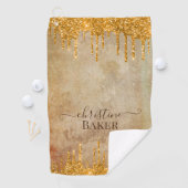 Goudglitterdruppels met nette aanraking golfhanddoek (Insitu)