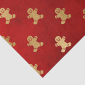 Goudkerst met ontbijtkoek op rode lospagina tissuepapier (Detail)