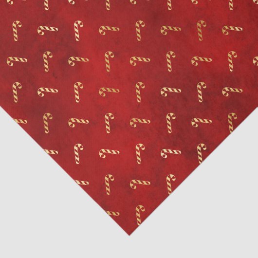 Goudkerstsnoerrietjes op rood tissuepapier (Detail)