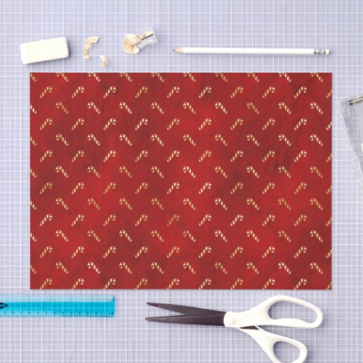 Goudkerstsnoerrietjes op rood tissuepapier (Craft)