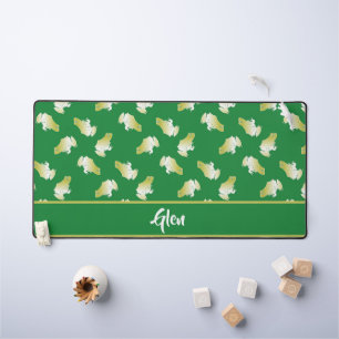 Goudkikkers op groen bureaumat