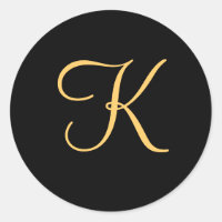 Goudkleurig initiaal K op de zwarte monogram stick