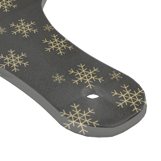 Goudsneeuwvlokken op grijs snijplank (Hoek)