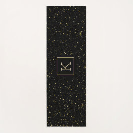 Goudsparken en glitter en zwart yogamat