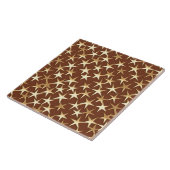 Goudsterren op chocoladebruin tegeltje (Zijkant)
