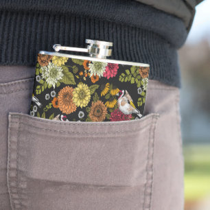 Goudvinken in de tuin op zwart heupfles