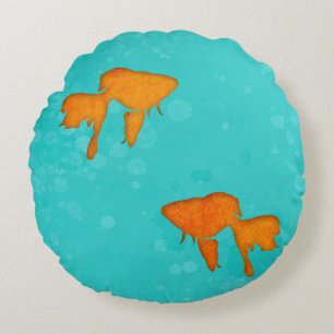 Goudvis oranje silhouettes in turkooiswater rond kussen