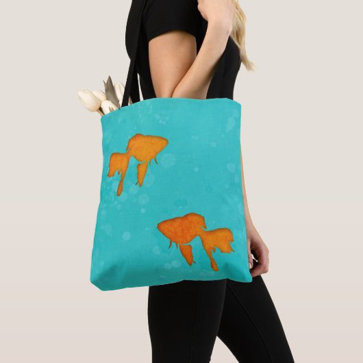 Goudvis oranje silhouettes in turkooiswater tote bag (Dichtbij)