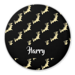 Goudvlekken op zwart keramische knop