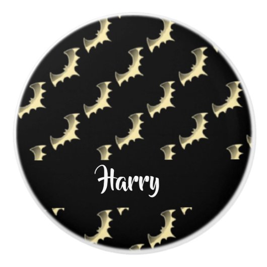 Goudvlekken op zwart keramische knop (Voorkant)