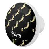 Goudvlekken op zwart keramische knop (Rechts)