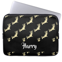 Goudvlekken op zwart laptop sleeve