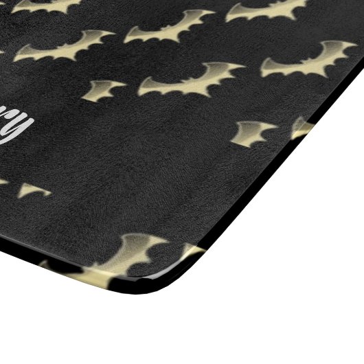 Goudvlekken op zwart snijplank (Hoek)