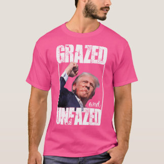 Graasde onaangetaste Trump overleefde schutter mis T-shirt