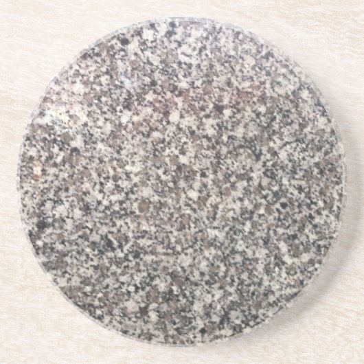 Graniet ziet uit naar de zee. zandsteen onderzetter (Voorkant)