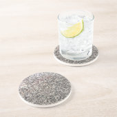 Graniet ziet uit naar de zee. zandsteen onderzetter (Zijkant)