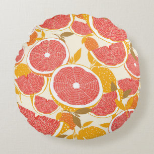 Grapefruit en halve snijwonden met bladeren op wit rond kussen