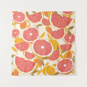 Grapefruit en halve snijwonden met bladeren op wit wandkleed