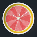 Grapefruit Slice Pop Art Minimalist Kitchen Food<br><div class="desc">Deze kleurrijke grapefruitklok is perfect voor uw keuken- of ontbijtnok-decor. Het show is een gesneden open afbeelding van een vrucht van pompelmoezen of van pomelo's, waarvan de helft bestaat uit 12 plakken in wisselende roze tinten, zodat je de tijd zonder cijfers kunt zien. Dit ongewone ontwerp heeft een getextureerde look...</div>