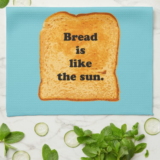 Grappig. Brood is als de zon. Theedoek (Gevouwen)