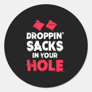 Grappig Cornhole-team laat zakken in je gat vallen Ronde Sticker