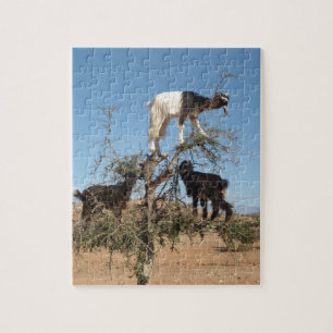 Grappig geit in een boom legpuzzel