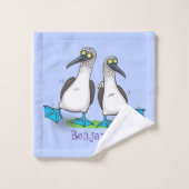 Grappig, gelukkig blauw gefundeerde cartoon die op bad handdoek (Wasdoekje)