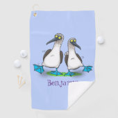 Grappig, gelukkig blauw gefundeerde cartoon die op golfhanddoek (Insitu)