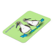 Grappig, gelukkig blauw gefundeerde cartoon die op magneet (Linkerzijde)