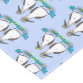 Grappig, gelukkig blauw gefundeerde cartoon die op medium tafelloper (Hoek)