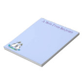 Grappig, gelukkig blauw gefundeerde cartoon die op notitieblok (Linkerzijde)