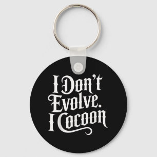 Grappig Gotisch citaat Ik evolueer niet in Cocoon Sleutelhanger