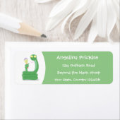 Grappig groene slang met maraca-cartoon etiket (Insitu)