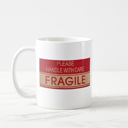 Grappig handvat met zorg, breekbaar teken koffiemok (Links)