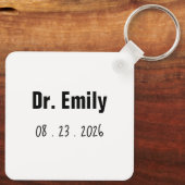 Grappig, het is Miss Mrs. Dr. Sleutelhanger (Achterkant)