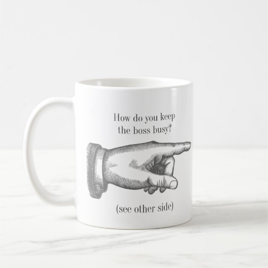Grappig  "Hoe houd je iemand bezig?" Koffiemok (Links)