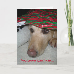 Grappig kerstkaartje, hond die naar de kerstman ki kaart
