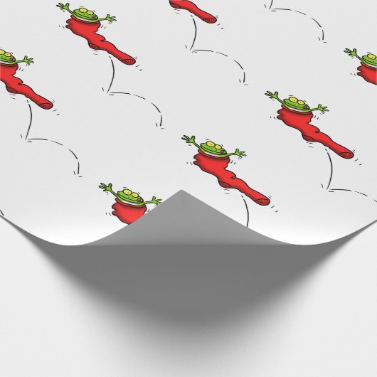 Grappig kikker in de rode kerstcartoon cadeaupapier (Hoek)