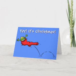 Grappig kikker in het rode wenskaart met kerstmis kaart
