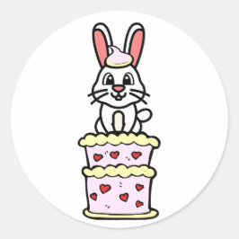 Grappig konijn springen uit een taart ronde sticker