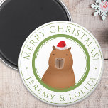 Grappig Schattige Capybara Santa Christmas Magneet<br><div class="desc">Verspreid de vreugde van het seizoen met onze Merry Christmas Capybara Santa Magnet. Pas het aan met een naam,  waardoor het een oprecht en doordacht cadeau is dat overal glimlacht. De capibara illustratie is handgetekend origineel kunstwerk van artbybiyan,  perfect voor capybara liefhebbers.</div>