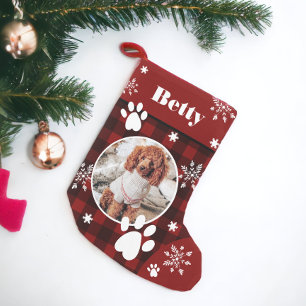 Grappig schattige rode zwarte vleiharde hond met k kleine kerstsok