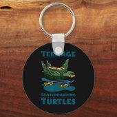 Grappig Tienerskatende Schildpadden Shirt – Schelp Sleutelhanger (Voorkant)