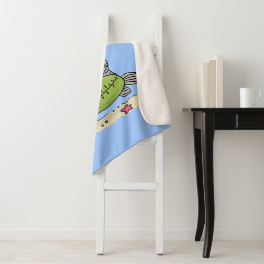 Grappig vethongerige groene visvisserij-cartoon sherpa deken (In situ)