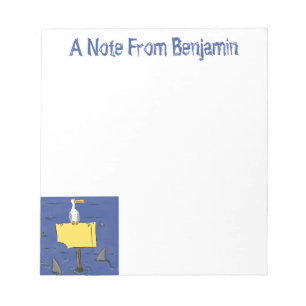 Grappig zee vogel omringd door cartoon van haaien notitieblok